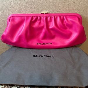 Grained Calf Fuchsia clutch bag. Never used. 100% authentic. Detachable strap.